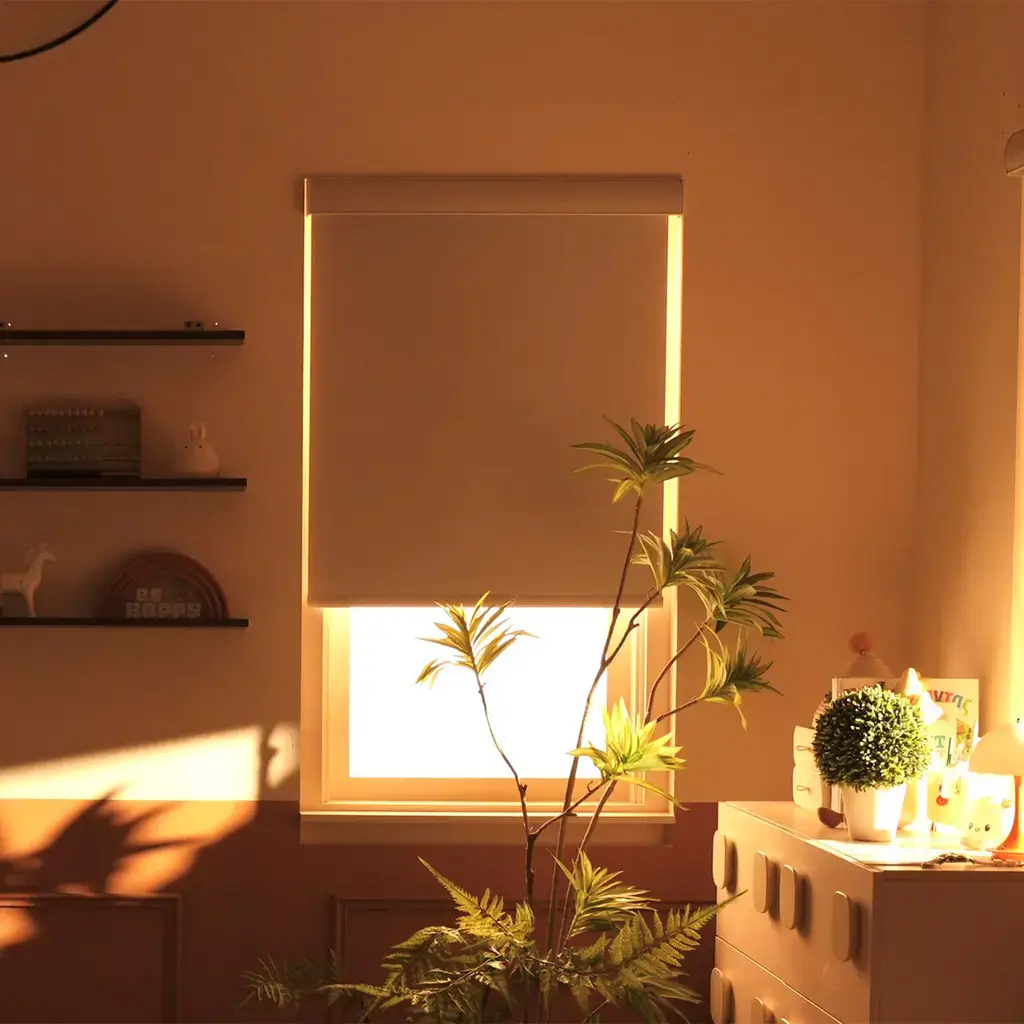 A well-lit design workshop with fabric samples and sketches for window blinds.
