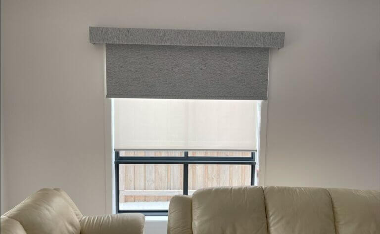 Sleek and modern roller blinds in a minimalist room.
