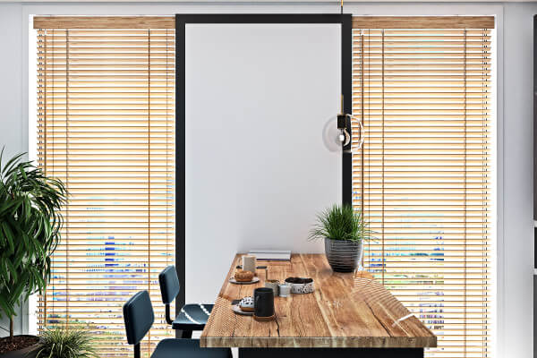Classic wooden venetian blinds providing excellent light control.