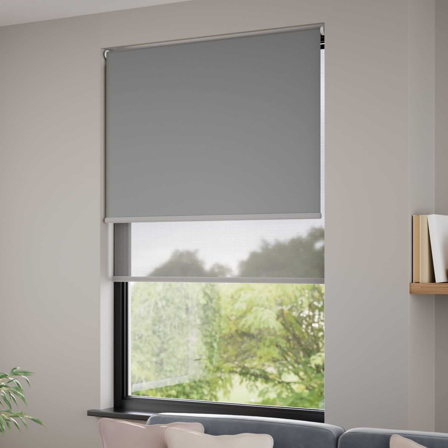 Motorized blackout roller blinds in a modern urban loft bedroom.